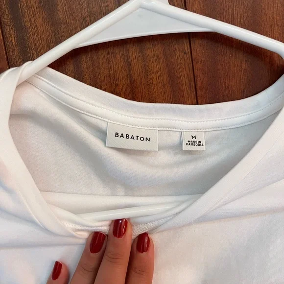 Aritizia white t-shirt with shoulder pads. Sold out online in medium! Worn once - Picture 1 of 6